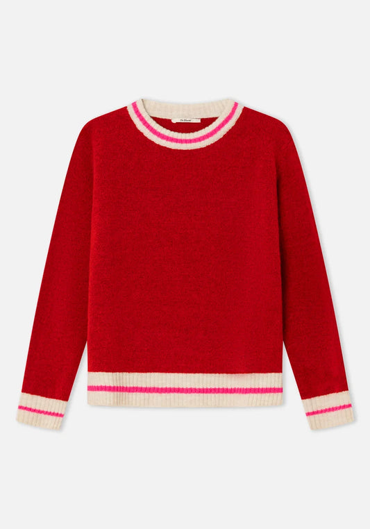 Jersey Berry Rojo de Dr Bloom puesto en mujer con corte relajado, punto suave y acabados fucsia