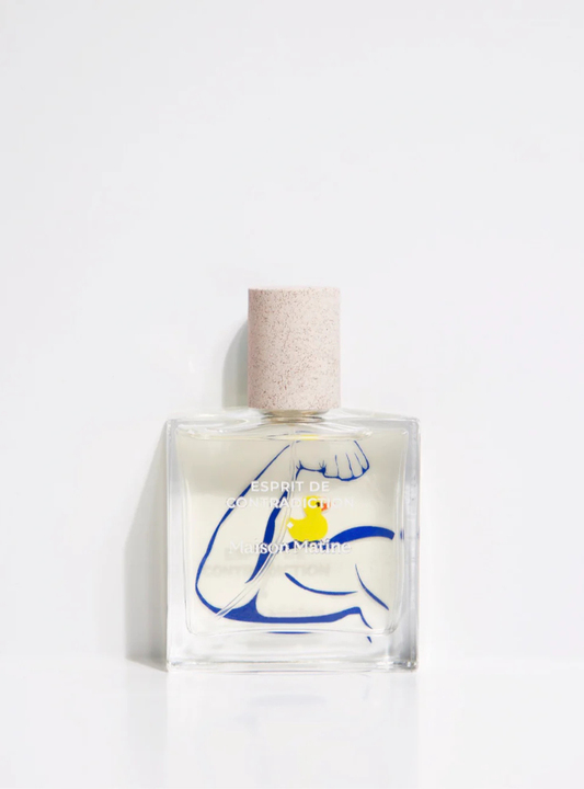 Perfume unisex Esprit de Contradiction de Maison Matine con notas de mandarina, jengibre y cedro.