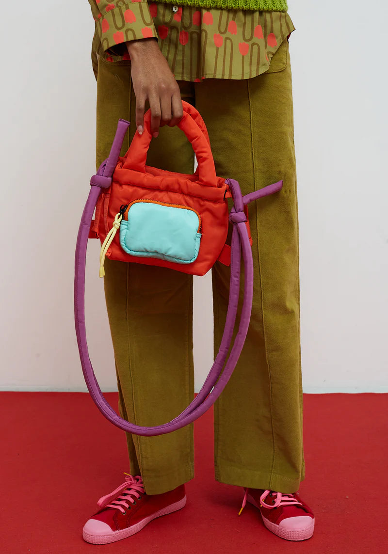 Bolso Flip naranja de Dr. Bloom con correa ajustable y cierre magnético