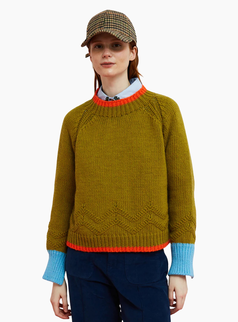 Jersey Dr. Bloom Serpentine Ocre para mujer en punto grueso con detalles en azul y naranja.