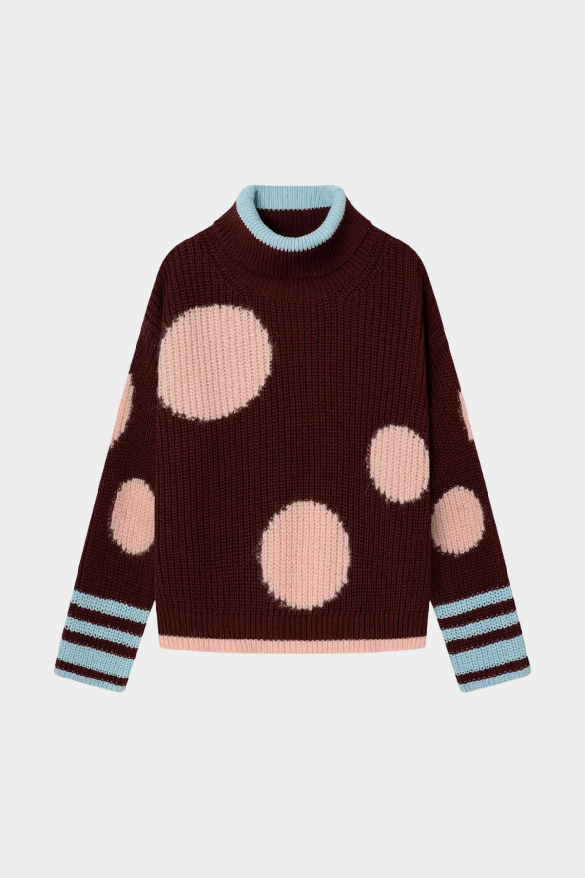 Jersey Bombon Vino de Dr Bloom puesto en mujer con corte relajado, lunares rosa y detalles azul cielo