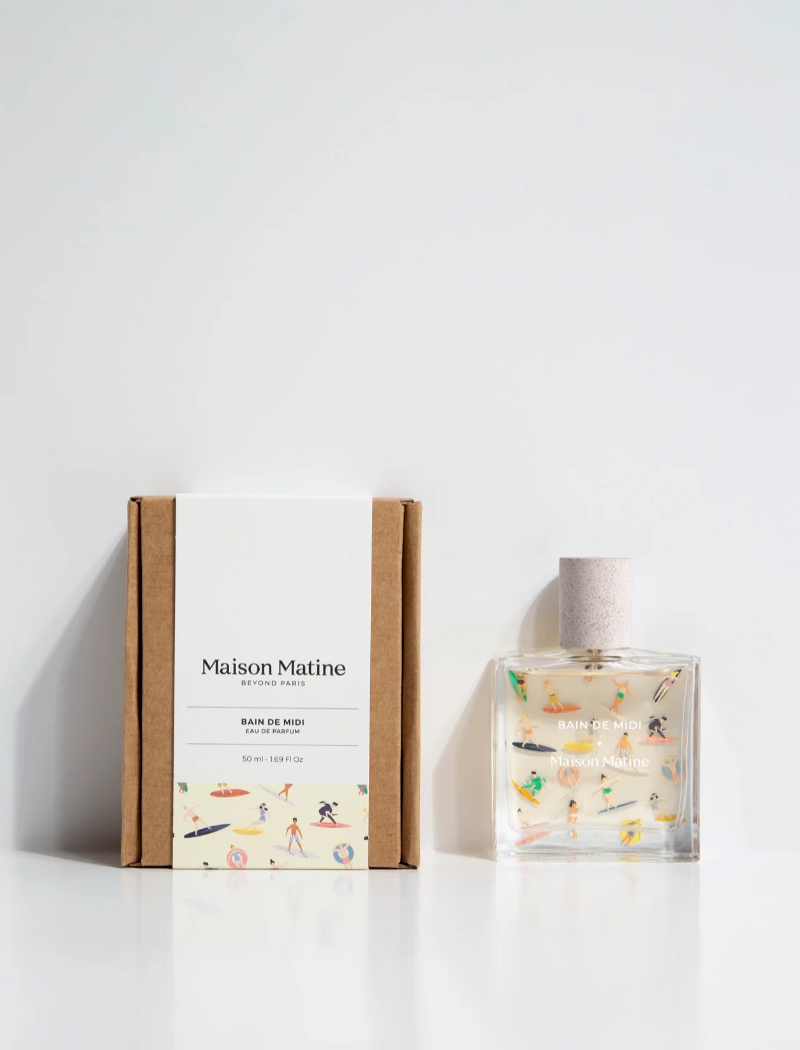 Perfume unisex Bain de Midi de Maison Matine con notas de coco, tiaré y vainilla.