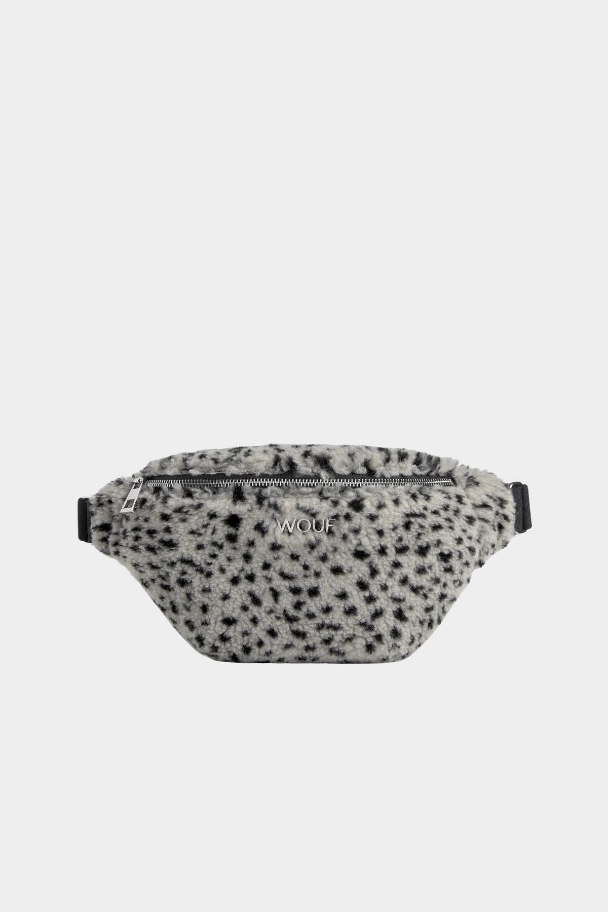 Riñonera Colette de Wouf en tejido teddy gris con microestampado negro, cremallera frontal y correa ajustable